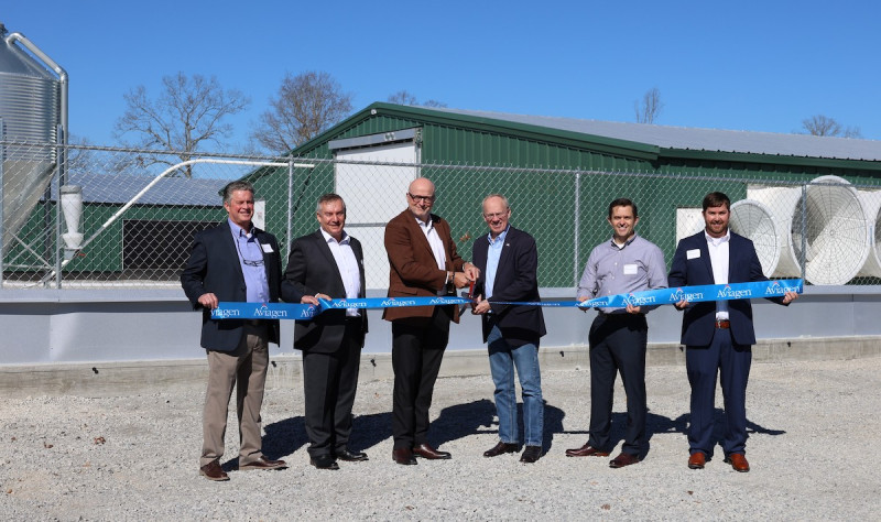 Aviagen officials cutting ribbon at new pedigree farm